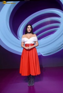 sonam kapoor hot looks in a white shoulderless top and red skirt at an event