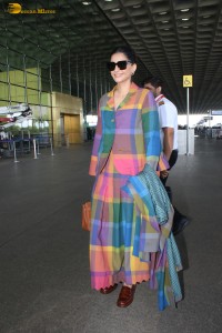 actress Sonam Kapoor wears a colorful dress traveling from mumbai airport