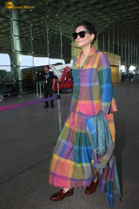 actress Sonam Kapoor wears a colorful dress traveling from mumbai airport
