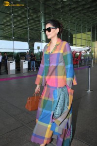 actress Sonam Kapoor wears a colorful dress traveling from mumbai airport