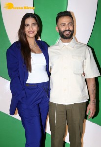 Sonam Kapoor, Anil Kapoor and Anand Ahuja attend the opening of the store 'VegNonVeg'