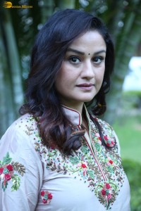 actress sonia agarwal photoshoot in a silver grey salwar dress