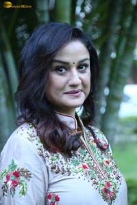 actress sonia agarwal photoshoot in a silver grey salwar dress