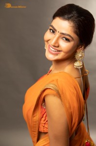 actress soniya bansal cute photoshoot in a orange saree