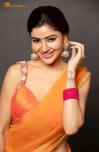 actress soniya bansal cute photoshoot in a orange saree