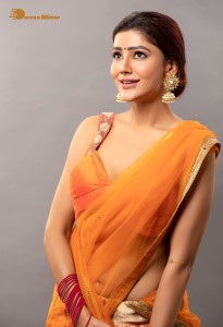actress soniya bansal cute photoshoot in a orange saree