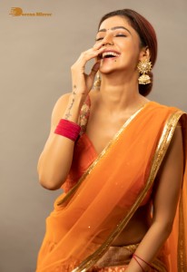 actress soniya bansal cute photoshoot in a orange saree