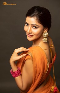 actress soniya bansal cute photoshoot in a orange saree