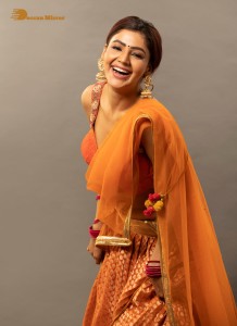actress soniya bansal cute photoshoot in a orange saree