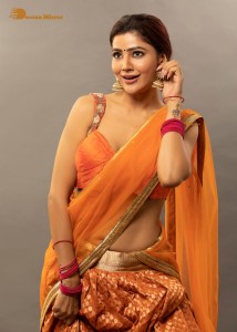 actress soniya bansal cute photoshoot in a orange saree
