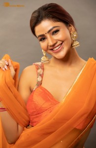 actress soniya bansal cute photoshoot in a orange saree