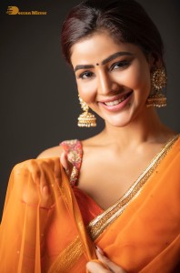 actress soniya bansal cute photoshoot in a orange saree