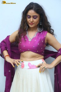 actress sony charishta in a pink top and white lehenga photoshoot