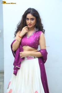 actress sony charishta in a pink top and white lehenga photoshoot