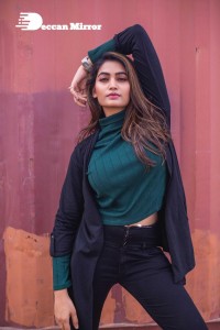 Actress Spandana Palli Photoshoot in Green Top and Black Jeans