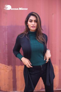 Actress Spandana Palli Photoshoot in Green Top and Black Jeans