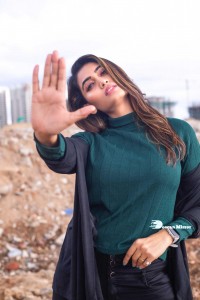Actress Spandana Palli Photoshoot in Green Top and Black Jeans