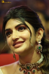 Indian actress Sreeleela beautiful in a white dress attending a movie function