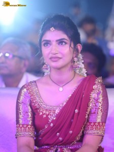 actress Sreeleela lovely looks in a red half saree
