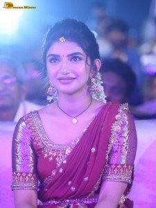 actress Sreeleela lovely looks in a red half saree