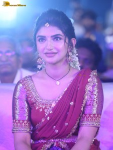 actress Sreeleela lovely looks in a red half saree