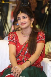 actress Sreeleela cute in a red half saree