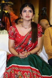 actress Sreeleela cute in a red half saree