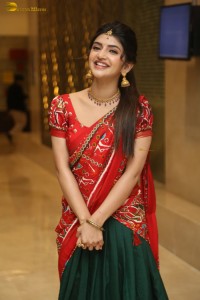actress Sreeleela cute in a red half saree
