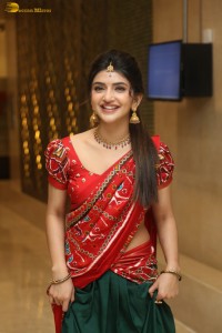 actress Sreeleela cute in a red half saree