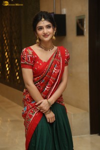 actress Sreeleela cute in a red half saree