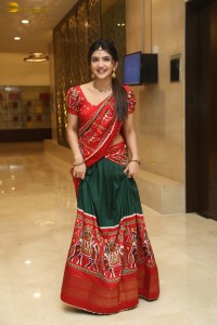 actress Sreeleela cute in a red half saree