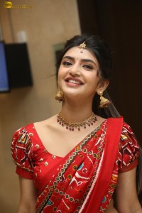 actress Sreeleela cute in a red half saree