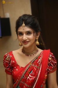 actress Sreeleela cute in a red half saree