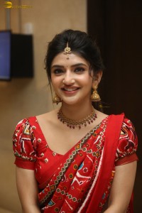 actress Sreeleela cute in a red half saree