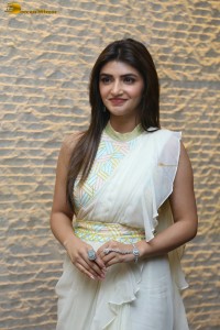 Tollywood actress sreeleela at a movie function dressed in white