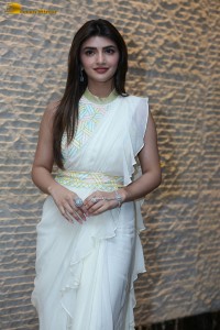 Tollywood actress sreeleela at a movie function dressed in white