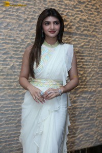 Tollywood actress sreeleela at a movie function dressed in white
