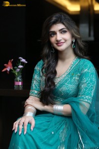Actress sreeleela in a green dress