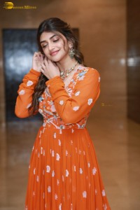 Telugu Actress Sreeleela in a orange salwar dress at a movie function