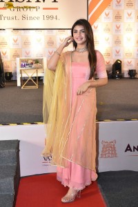 Tollywood actress sreeleela in a pink salwar dress at an event