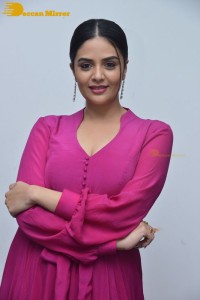 Popular anchor and actress Sreemukhi photoshoot in a pink dress