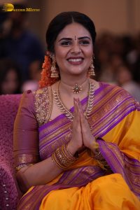 anchor and actress sreemukhi beautiful in a yellow and pink saree