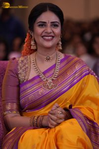 anchor and actress sreemukhi beautiful in a yellow and pink saree