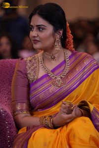 anchor and actress sreemukhi beautiful in a yellow and pink saree
