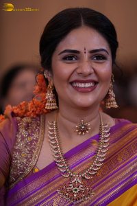 anchor and actress sreemukhi beautiful in a yellow and pink saree