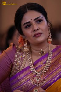 anchor and actress sreemukhi beautiful in a yellow and pink saree