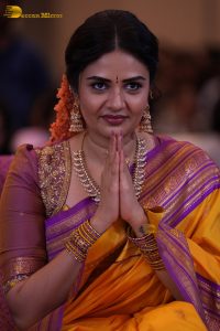 anchor and actress sreemukhi beautiful in a yellow and pink saree