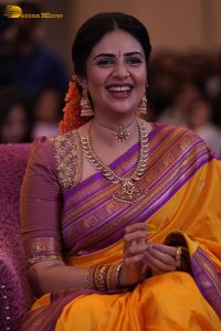anchor and actress sreemukhi beautiful in a yellow and pink saree