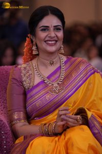 anchor and actress sreemukhi beautiful in a yellow and pink saree