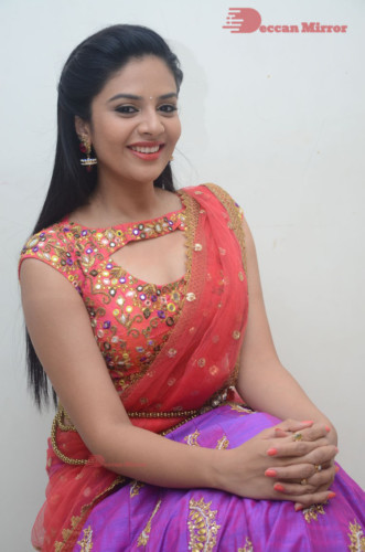 Telugu Actress Sreemukhi in a half saree dress